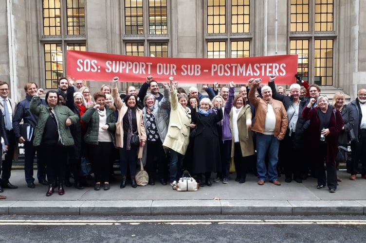 Sub-postmasters celebrate at the High Court on December 16, 2019.