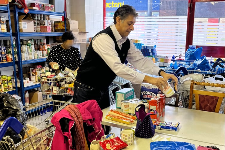 Lib Dem candidate for Farnham and Bordon, Khalil Yousuf, helping out at Bordon Foodbank