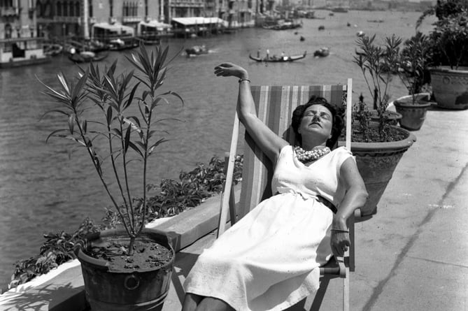 Peggy Guggenheim on the roof terrace of Palazzo Venier dei Leoni in Venice, early 1950s (Photo: Archivio Cameraphoto Epoche)