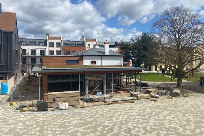 The scaffolding was removed from the Grade II-listed Brightwell House at the heart of the Brightwells Yard development in Farnham this week – revealing the building's new roof and extension. Once complete, it will accommodate a Coppa Club restaurant.