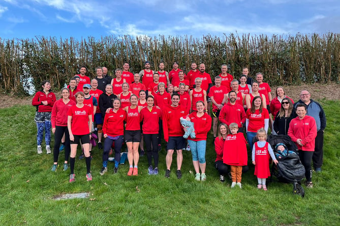 Liss Runners members smile for this year's club photo