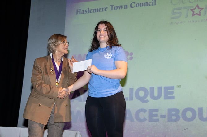 Weightlifter Angelique Wallace-Bourgoin receives her Create a Star award from the Mayoress of Haslemere at the 2023 awards ceremony (Photo: Alex Anderson)