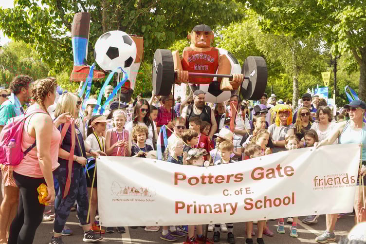 Potters Gate school's curling puppet at Farnham Carnival 2024