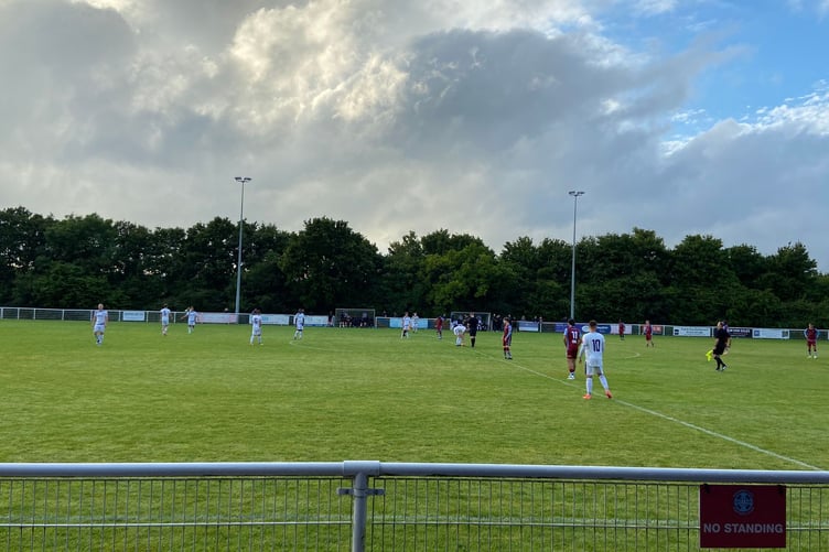 Action from Badshot Lea's pre-season friendly against Basingstoke Town