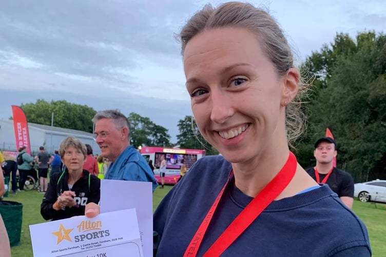 Lizzie May with one of her prizes