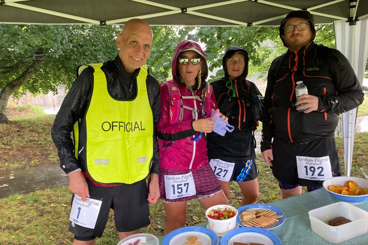 Farnham Pilgrim Marathon tailenders enjoying a snack