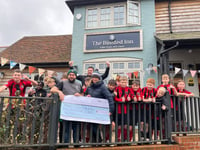 Cheers to village pub for football club donation