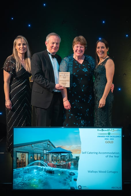 Owners Andrew and Katherine Graham (centre) celebrate their win