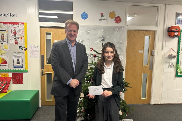 All smiles for the winner of Mp Greg Stafford's very first Christmas competition
