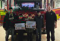 Muslim association distributes festive food to Surrey firefighters and police