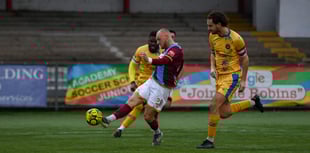 League leaders Town return to action with solid away win
