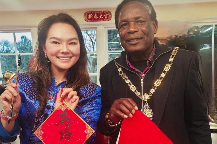 Linna Hardwick, headteacher of Triple Fun Chinese Language School, and Farnham mayor Cllr Brodie Mauluka at the Chinese New Year celebrations at Farnham Library.
