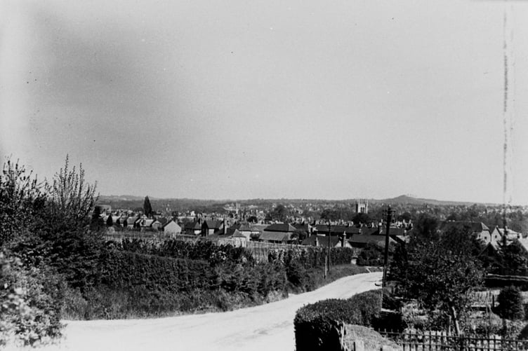 A view of Farnham taken from Crondall Lane, showing the hop fields in the centre - some of the last to grow the crop in the town until the early 1970s