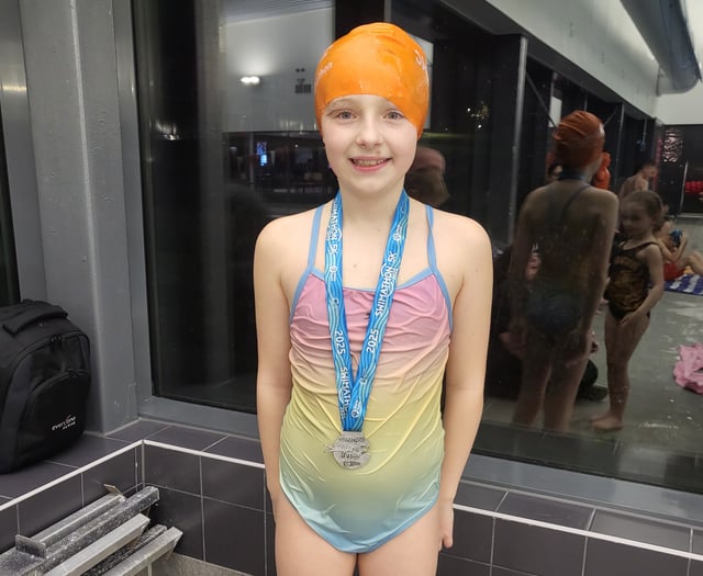 Tears of joy as determined pupil swims 5k for charity