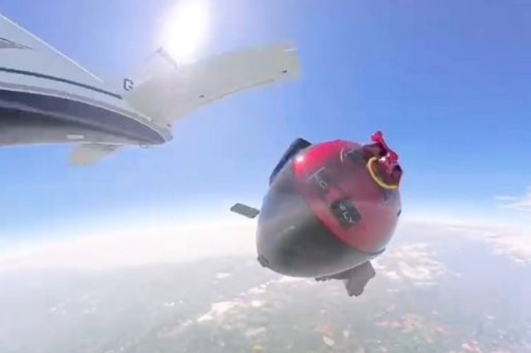 Casey Flay skydiving - His phone falls from his pocket (L). Release date  May 5, 2025.  A skydiver whose phone flew out of his pocket at 14,000ft was stunned when he later tracked it down to a forest and found it - without a scratch on it. Casey Flay, an experienced wingsuiter and skydiver, jumped from the plane like he had so many times before but completely forgot to zip the front pocket with his phone in. A video of his skydive in Honiton, Devon, shows the 37-year-old preparing to leap with his iPhone 13 Pro Max peeking out of his overalls. As he takes his leap, the phone flies out of his pocket and plummets towards the Earth. Following his dive, engineer Casey - oblivious to the fact his phone had fallen alongside him - asked others in the plane if he'd left it up there. But he was shocked when he used the Find My iPhone app to track his phone down to a forest four miles away from where he'd landed. Even more surprising, however, was the fact that the 14,000ft (2.65 mile) drop appeared hardly to have left a mark on his device.