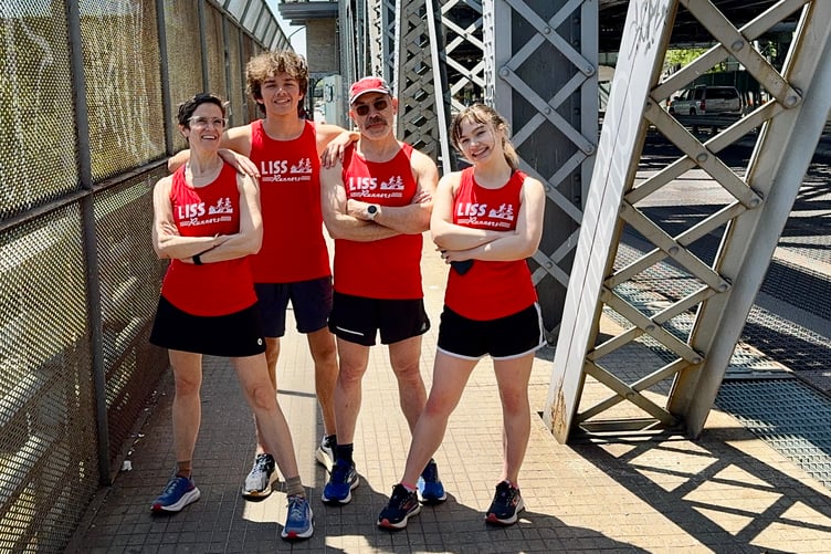 Maydelle, Vaughan, Daniel and Sylvie Liss pictured mid-run on the bridge from Manhattan to the Bronx