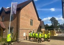 Developer shows its class with special tour for Bordon school's construction club