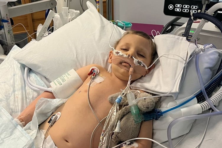 Felix Disney-Moore pictured during treatment for trilateral retinoblastom â he had to undergo eight months of chemotherapy. The parents of a little boy diagnosed with two rare cancers before the age of three were "relieved" to discovered he had blood cancer instead of the disease in his eye spreading - because it gave him "a chance of survival". Felix Disney-Moore, four, had no symptoms until his mum, Hayley Disney, 40, spotted a white glow left eye and took him for a check-up at Frimley Park Hospital, Surrey. He was urgently referred to Royal London Hospital and diagnosed with bilateral retinoblastoma - a form of eye cancer that affects both eyes - and the family were told he'd need his left eye removed to save his life.