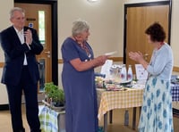 Headley gardeners serve up tasty donation to charity nurses
