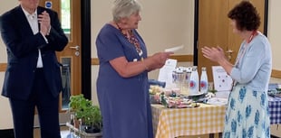 Headley gardeners serve up tasty donation to charity nurses