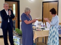 Headley gardeners serve up tasty donation to charity nurses
