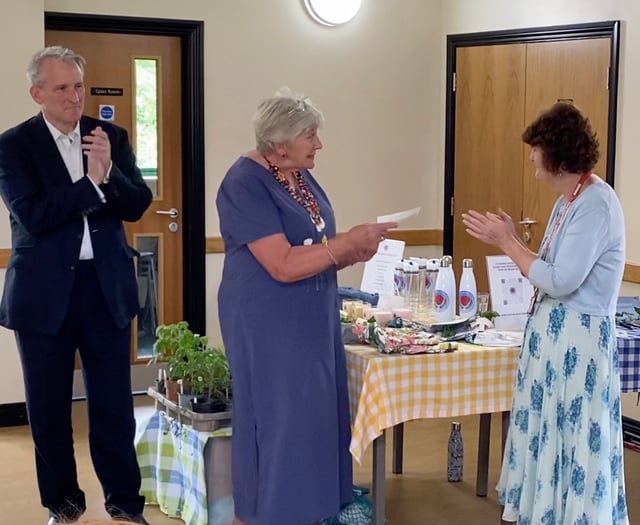 Headley gardeners serve up tasty donation to charity nurses