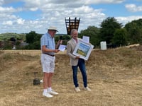 High praise as benefactor gifts hill to village