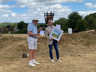 High praise as benefactor gifts hill to village