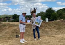 Elstead celebrates hot acquisition as benefactor gifts Bonfire Hill to village