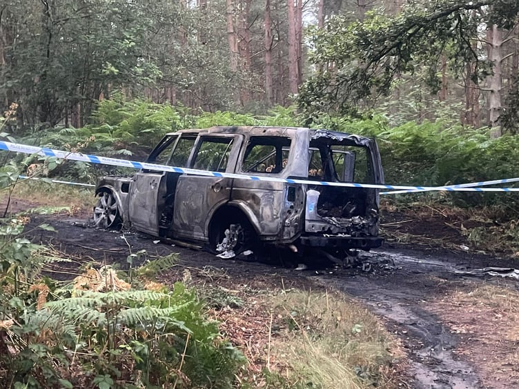 Burned car wreckage Longmoor Bordon
