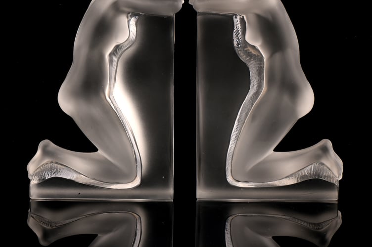 Glass bookends by French designer Marie-Claude Lalique.