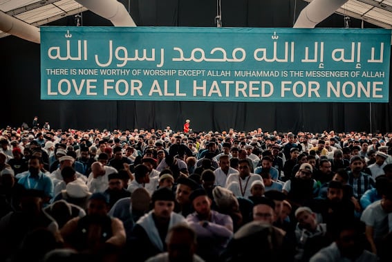 Love for all hatred for none sign- at the main marquee at Jalsa Salana 2025