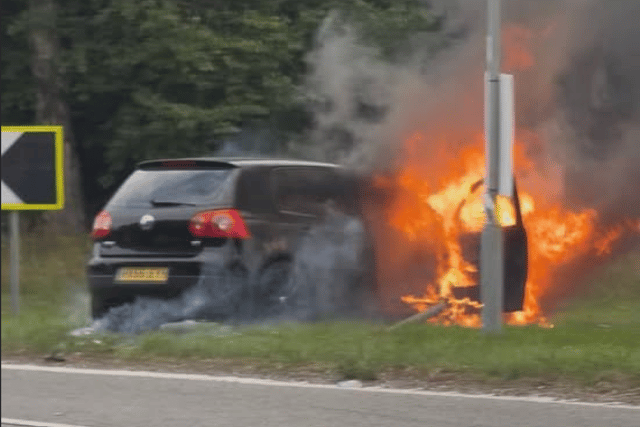 A31 shut as firefighters deal with car blaze
