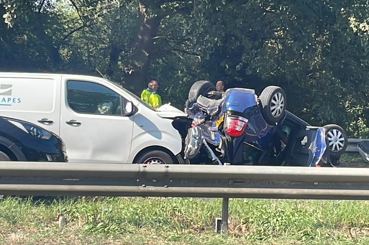 Overturned car A31 Farnham bypass