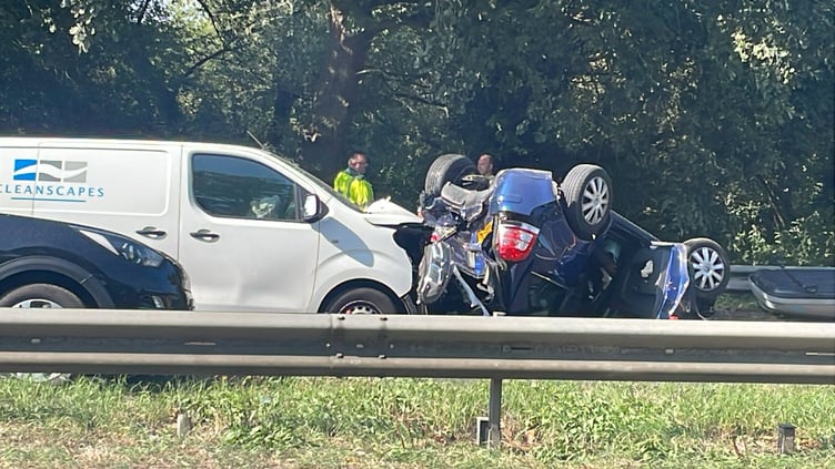 Overturned car A31 Farnham bypass