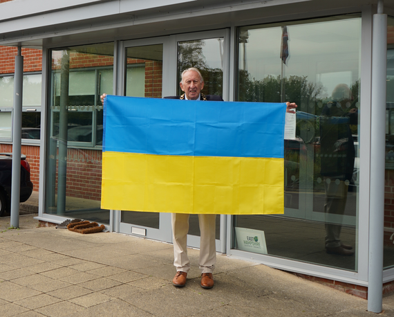 Cllr Graham Hill with the flag of Ukraine, August 22nd 2025.
