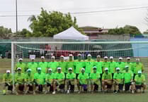 Football team scores fundraising goal in memory of Alan Newell