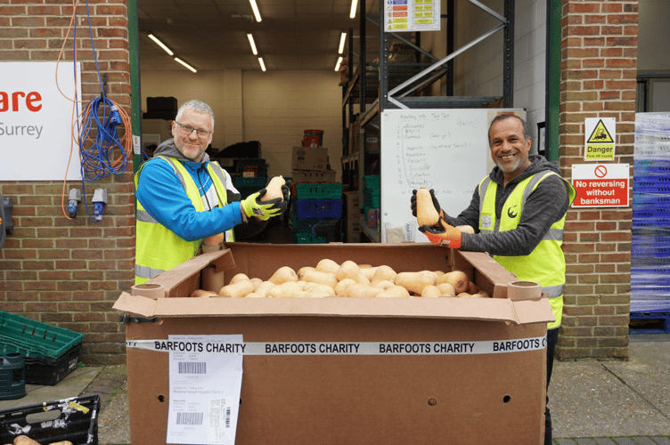 FareShare Surrey & Sussex volunteers sort some surplus food.