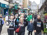 One man's feet as town goes marching on Together for Kev