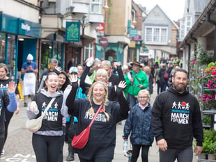 One man's feet as town goes marching on Together for Kev