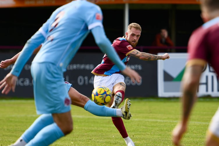 Bobby-Joe Taylor fires home Farnham Town's second goal of the afternoon