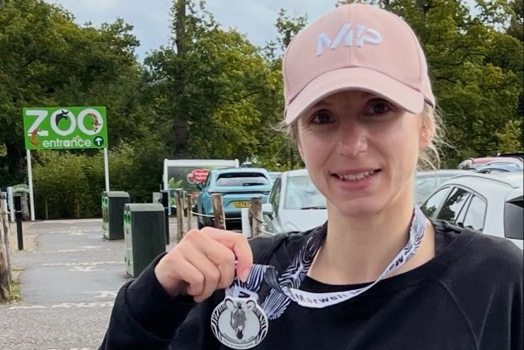 Charlotte Nunns with her Marwell Zoo 10km medal
