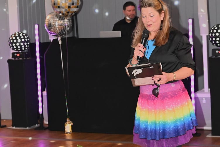 Organiser Debbie Moorcroft introduces the 40th anniversary evening