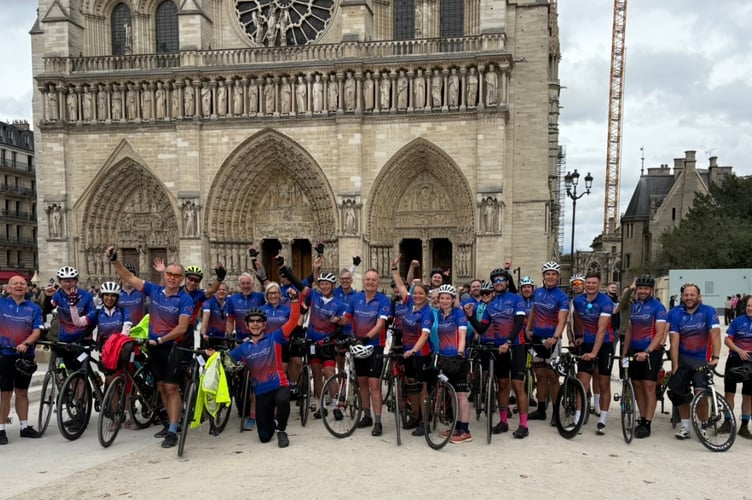 The Phyllis Tuckwell cyclists outside Notre Dame Cathedral in Paris.