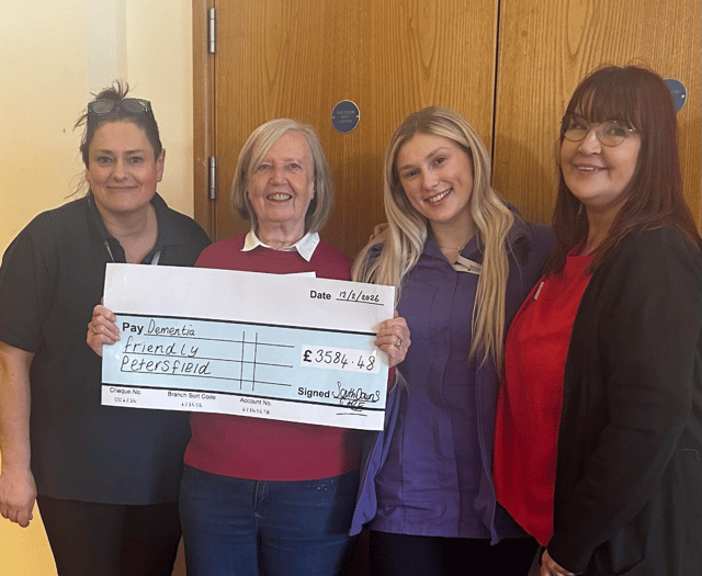 Care in the community as £3,500 handed to dementia charity