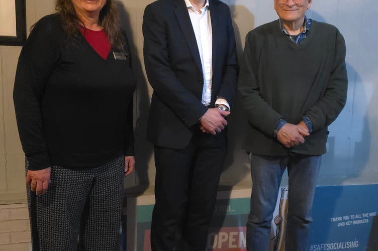 Alton town clerk Tom Horwood, centre, with Alton Rotary Club officers Lisa Hillan and Mike Sanders, March 2026.