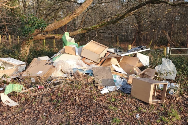 Fly-tipping blights a rural lane in southwest Surrey, adding cost and frustration for local volunteers tasked with clearing waste.