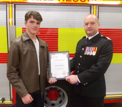 Boy, 15, given award for saving neighbour with defibrillator