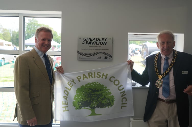 Greg Stafford and Cllr Graham Hill unveil the plaque for Headley's refurbished Sport Pavillion