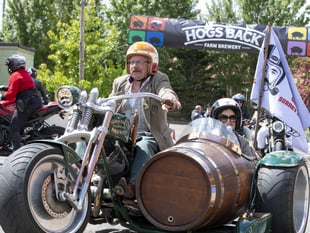 Enjoy the ride! Dapper dressers hit the road in fundraising drive